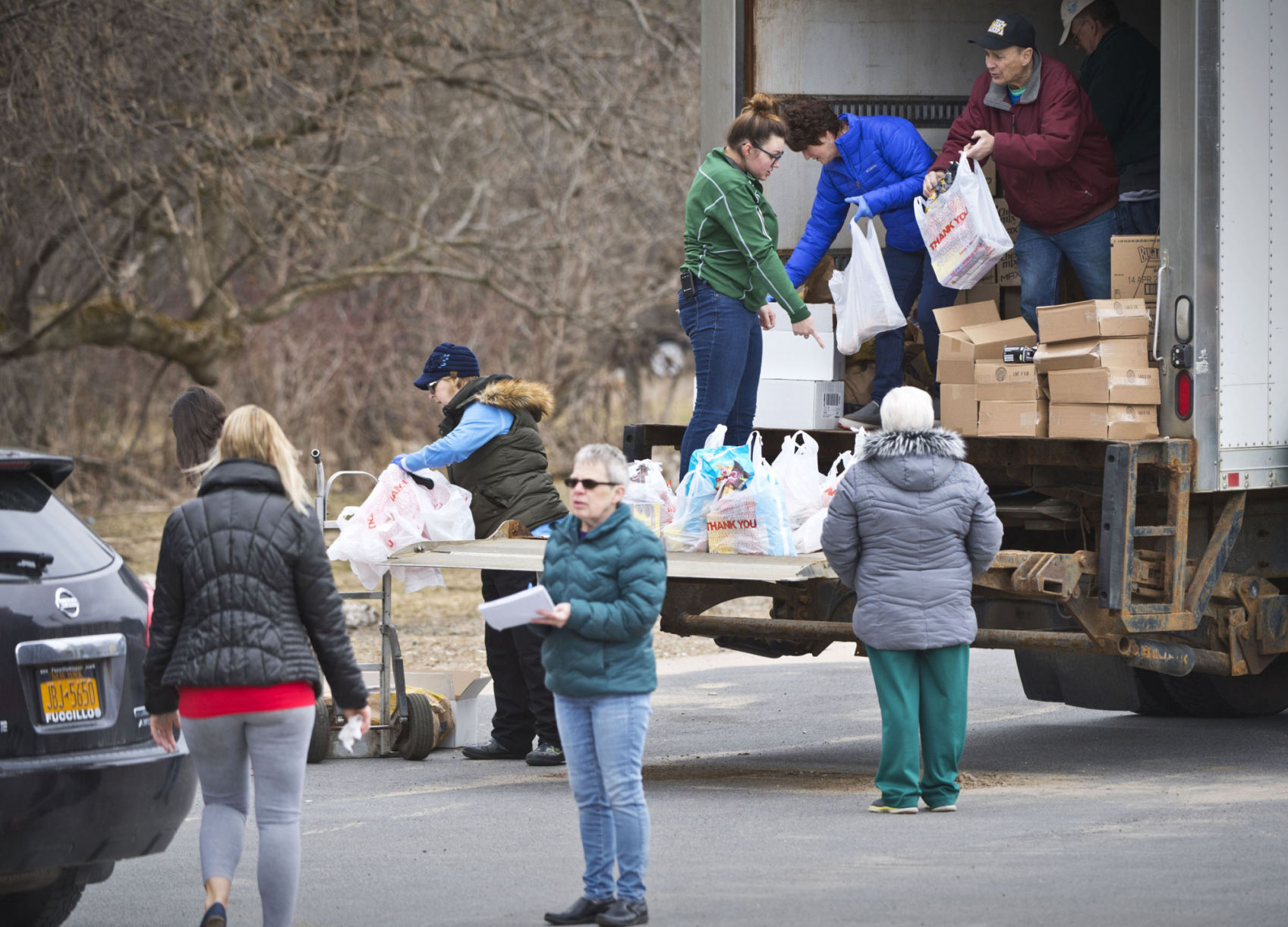 Norwood retailer gives away food